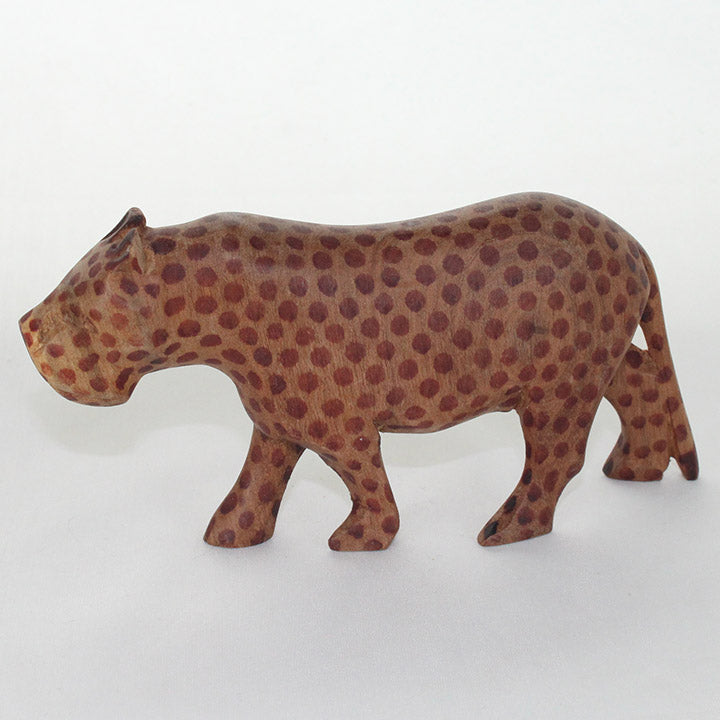 carved wood leopard figurine facing left