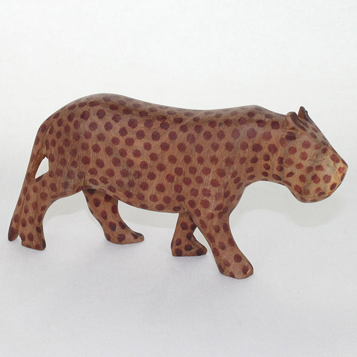 carved wood leopard figurine facing right