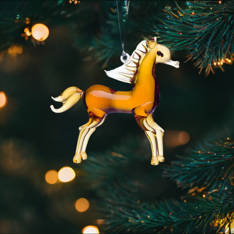 glass horse ornament figurine hanging on christmas tree branch