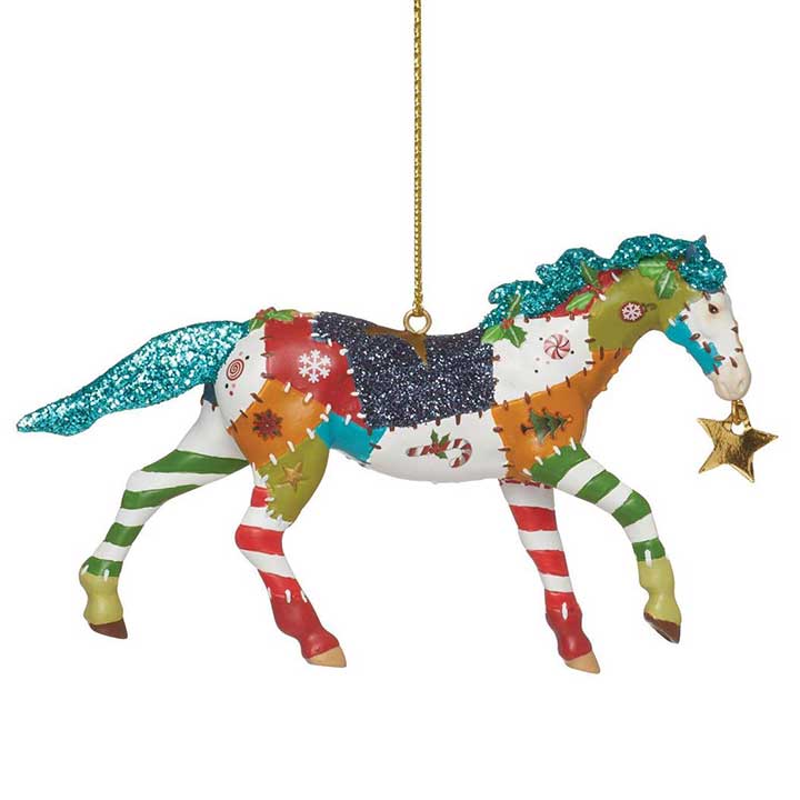 trail of painted ponies holiday patchwork horse ornament, crazy quilt patterned horse carrying a gold star in mouth - right side view with cord