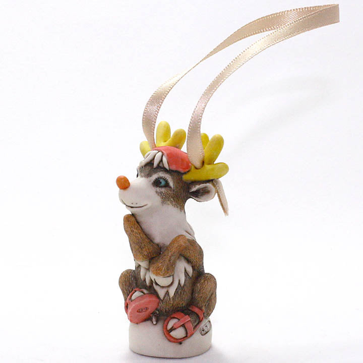 harmony kingdom prancer reindeer ornament - front, left side view showing peter calvesbert mouse and ribbon