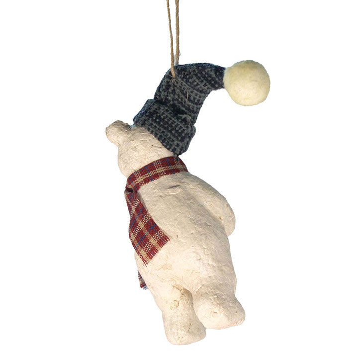 back view of paper pulp polar bear in green knitted stocking cap ornament with white background