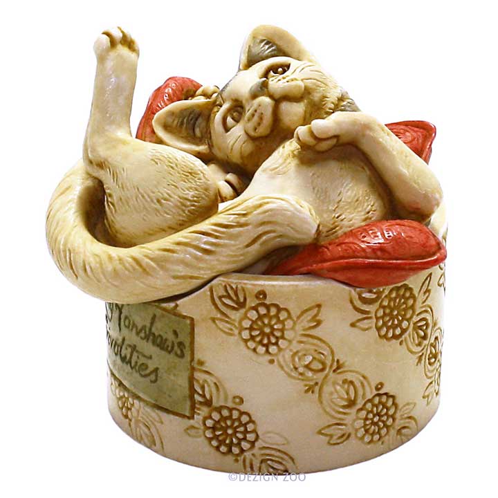 Harmony Kingdom Reboux cat in hat box treasure jest - side view showing front of cat's face and end of tail