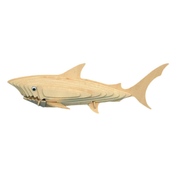 Wooden shark 3d puzzle on a white background