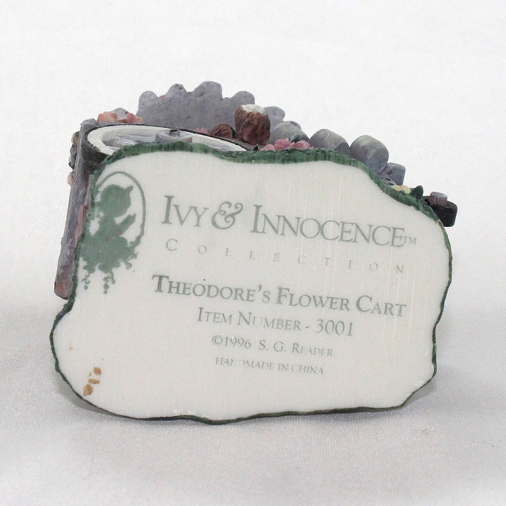 Bottom of decorative Theodore's Flower Cart figurine with 'Ivy & Innocence' branding item number and date