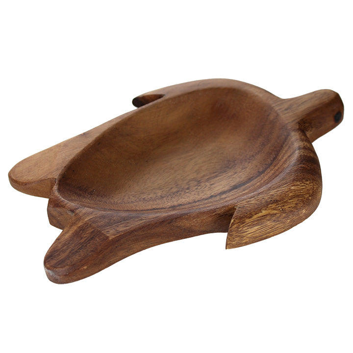 Wooden turtle-shaped dish on a white background