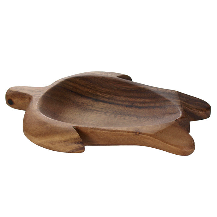 Wooden turtle-shaped catch all dish on a white background