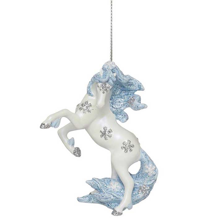 trail of painted ponies winter wonderland ornament, rearing white stallion with snowflakes on body, front left view showing cord for hanging