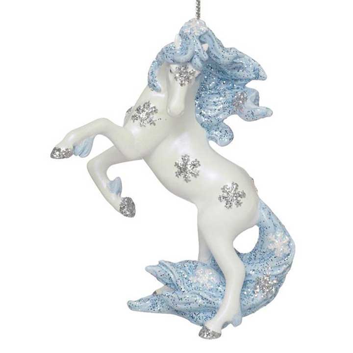 trail of painted ponies winter wonderland ornament, rearing white stallion with glittered blue mane and tail and silver snowflakes on body, left side view