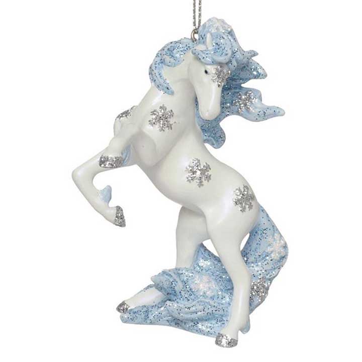 6012856 trail of painted ponies winter wonderland ornament, rearing white stallion with glittered blue mane and tail and silver snowflakes on body, front left view