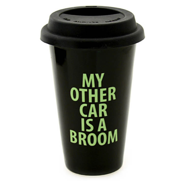back side view of ceramic travel mug with silicone lid and printed words MY OTHER CAR IS A BROOM
