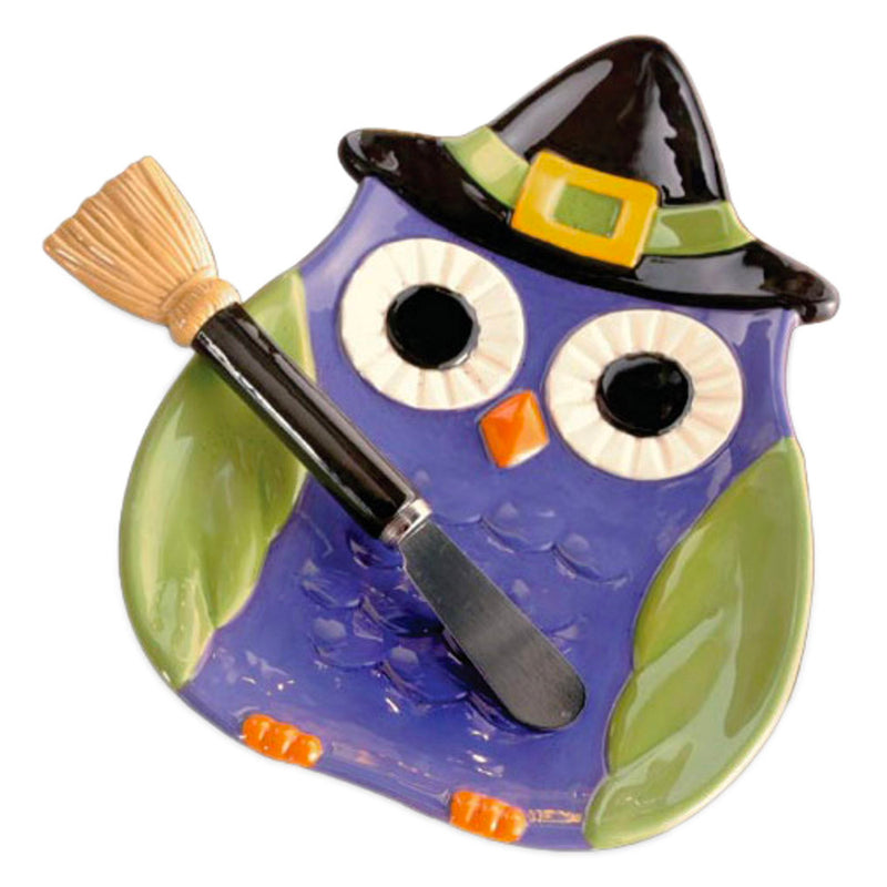 purple, green, yellow and black ceramic owl witch serving plate and spreader knife with broom stick handle