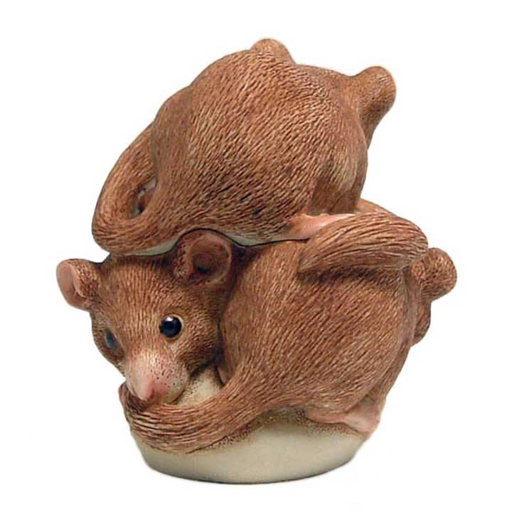 Harmony Kingdom Bed and Breakfast dormouse box figurine - side view showing backs of two mice, face of a third