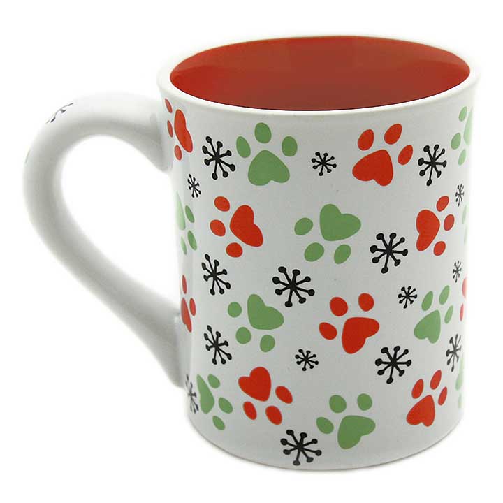 enesco, our name is mud, good cat mug - side with handle to left showing white background, red, green and black snowflake and paw print designs, red interior