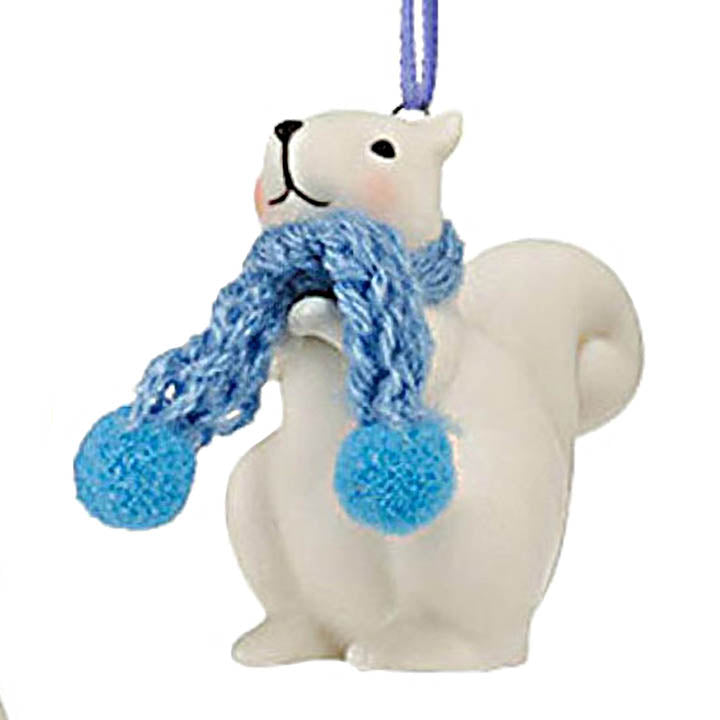 department 56 white porcelain squirrel ornament wearing a blue knit scarf hanging from color coordinating ribbons