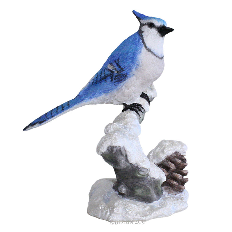 blue jay on snowy branch figurine