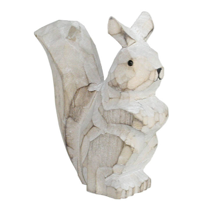 carved wood squirrel figurine facing right