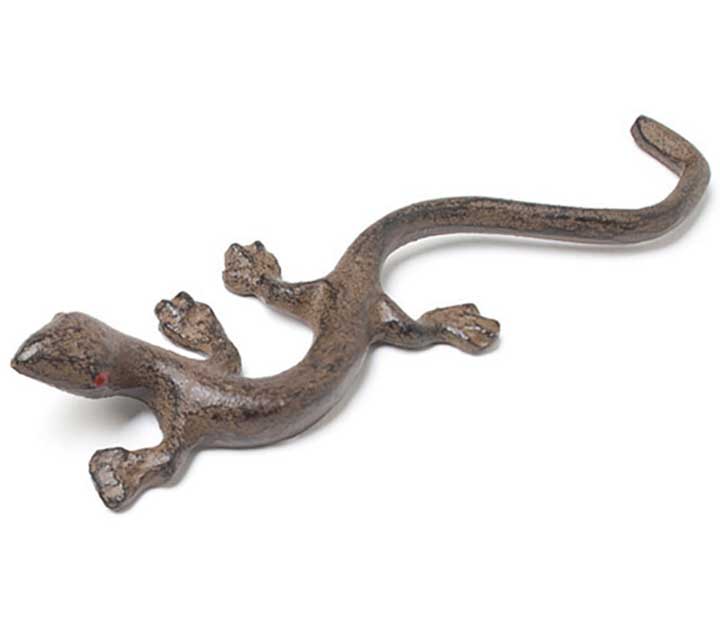 small cast iron lizard figurine with red glass eye - top left side view