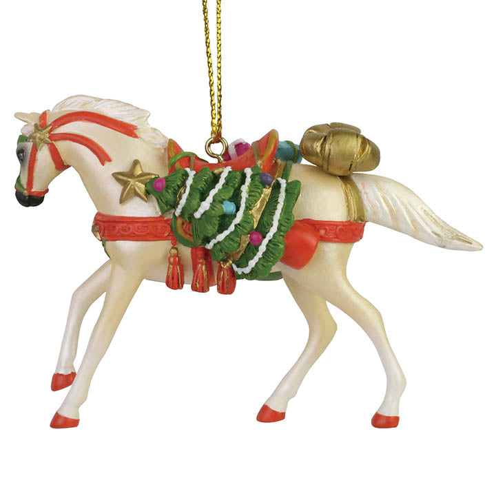 trail of painted ponies palomino horse with sack of christmas presents ornament left side view
