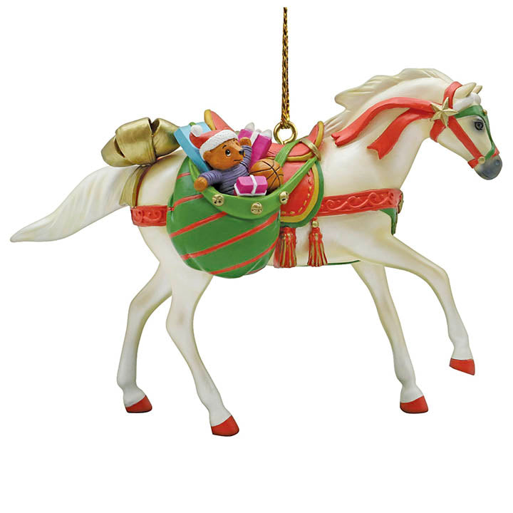 trail of painted ponies palomino horse with sack of christmas presents ornament right side view