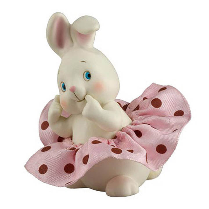department 56 dottie collection white porcelain bunny figurine with curious expression on face wearing a pink with red polka dotted ribbon tutu