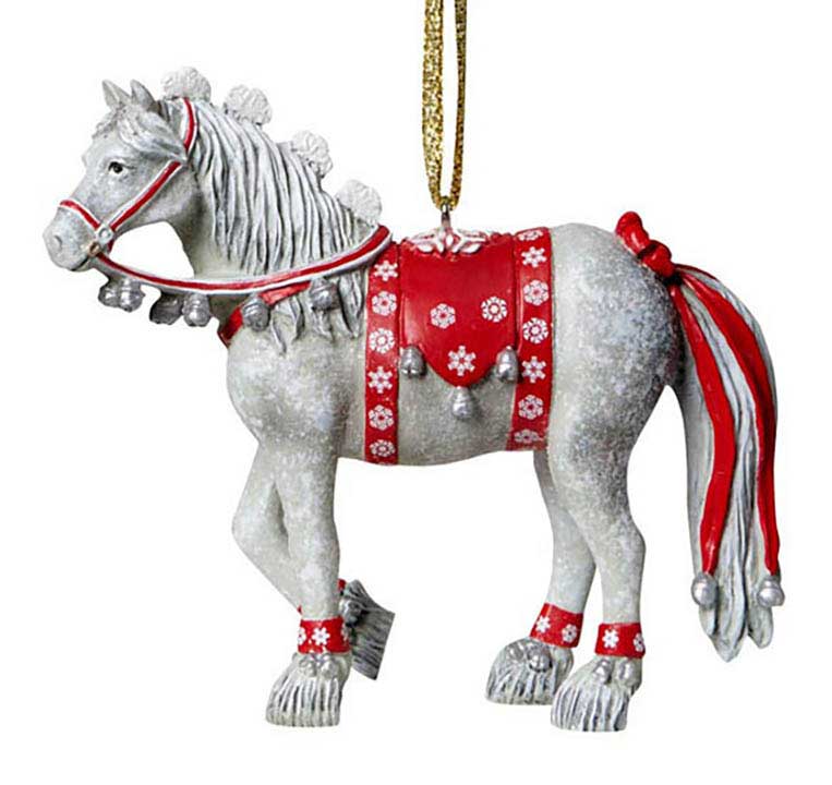 trail of painted ponies dashing through the snow ornament of gray horse with red ribbon halter and tail decoration, red saddle and ankle cuffs with silver bells - left side view