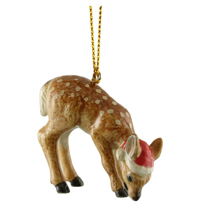 porcelain baby fawn deer in santa hat christmas ornament hanging from gold colored cord right side view
