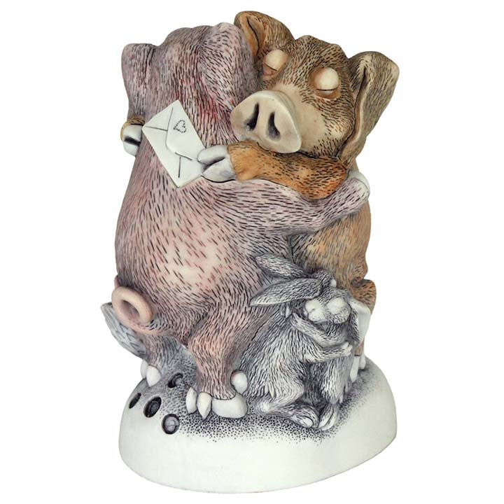 harmony kingdom hogs and kisses box figurine showing hugging hogs and rabbits