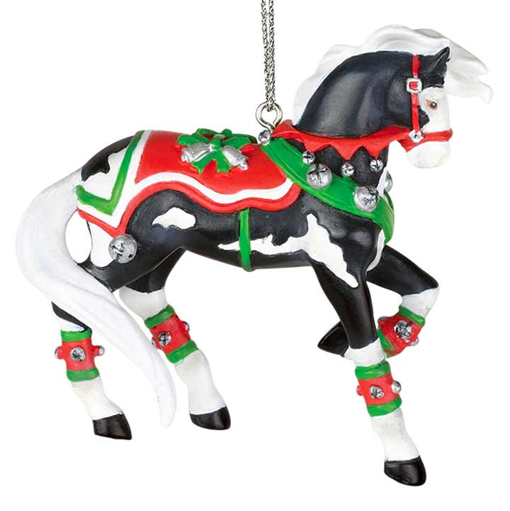 trail of painted ponies 6002914 jingle all the way ornament - black and white spotted horse with red, green and white tack, right side view