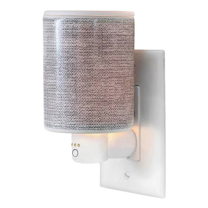 Linen design plug-in outlet wax warmer with timer - shown in outlet