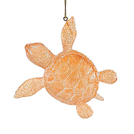 department 56 faux coral colored glass sea turtle ornament hanging from gold colored cord