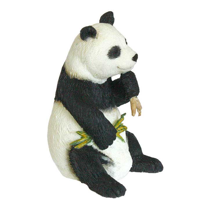right side view view of country artists brand minature figurine of sitting giant panda holding bamboo branches in both paws