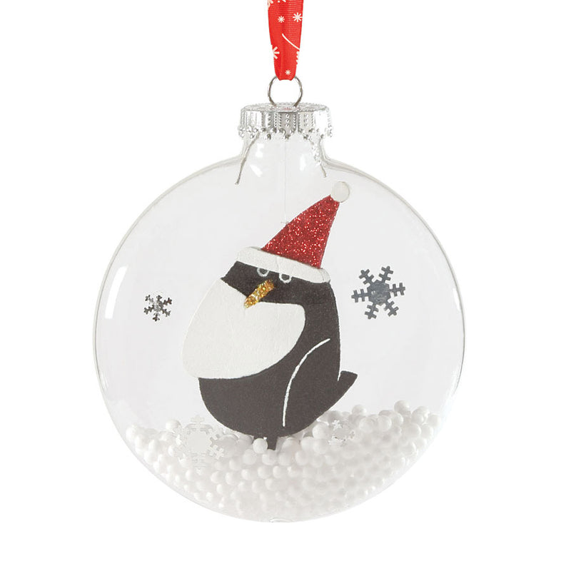 department 56 animalz collection penguin in santa hat and styrofoam snow inside a glass disc ornament hanging from red and white ribbons