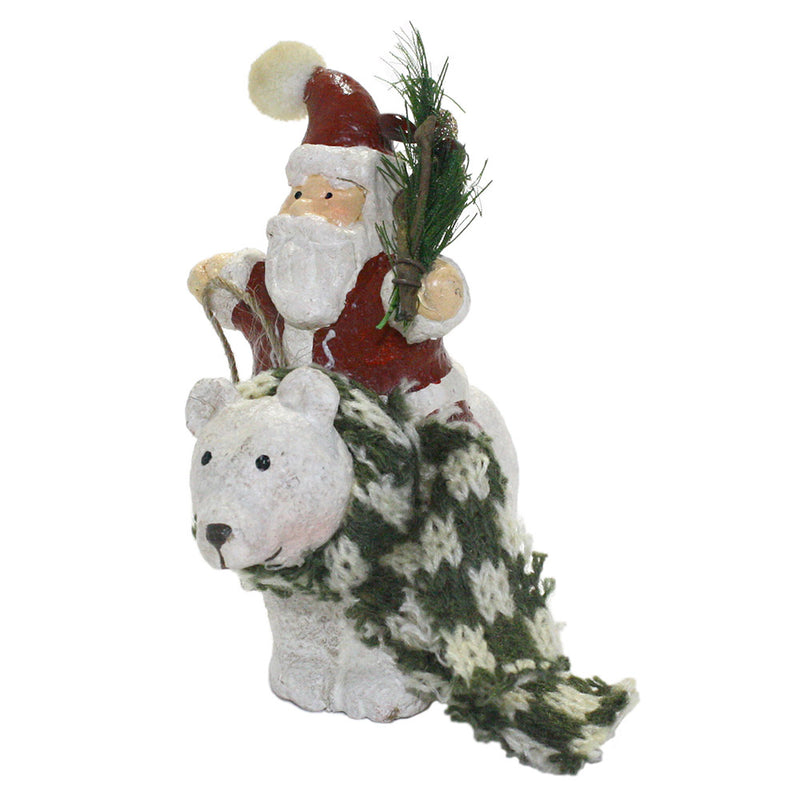santa with pine bough riding polar bear ornament left side view