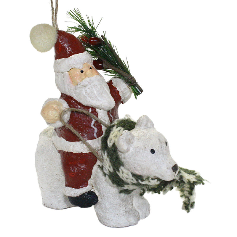 santa with pine bough riding polar bear ornament