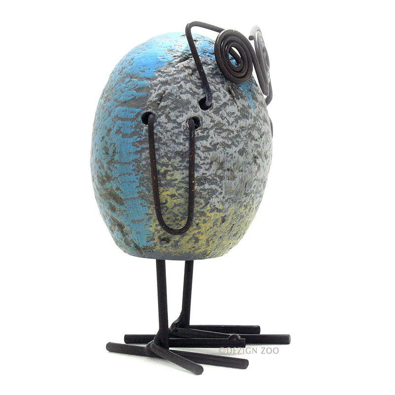resin rock and metal owl figurine side view