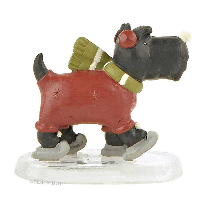 blossom bucket black scotish terrier dog in red sweater with green striped scarf and skates on ice