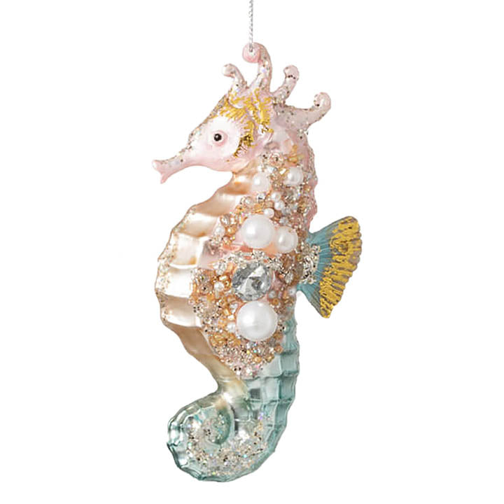 glass pastel pink and blue seahorse ornament with faux pearl, rhinestone and glitter accents hanging from silver colored cord