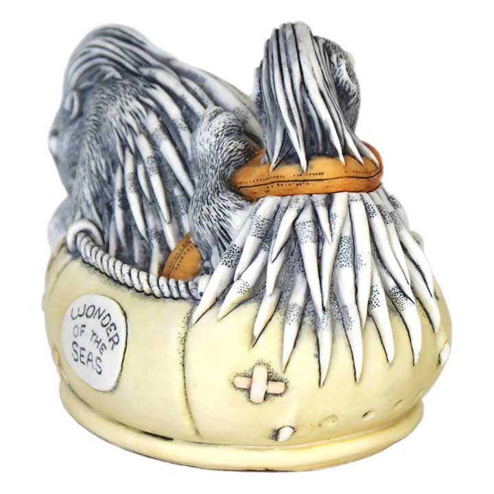 Harmony Kingdom Tail Wind Treasure Jest box figurine, back view of 2 porcupines in a rubber dighy