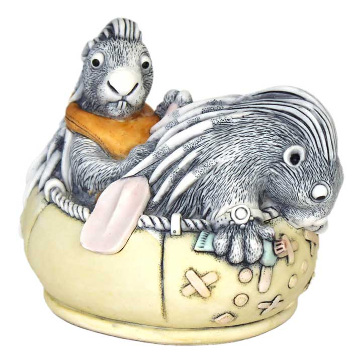 Harmony Kingdom CTJPO51 Tail Wind Treasure Jest box figurine, 2 porcupines in a rubber dighy, one in life vest with paddle, one looking over edge with watch and tube of puncture repair