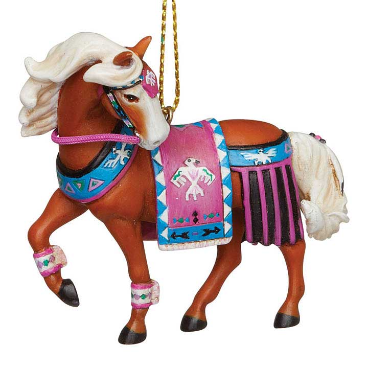 trail of painted ponies 6009160 thunderbird ornament, palamino horse with blue and pink thunderbird art riding gear - closeup, left side view