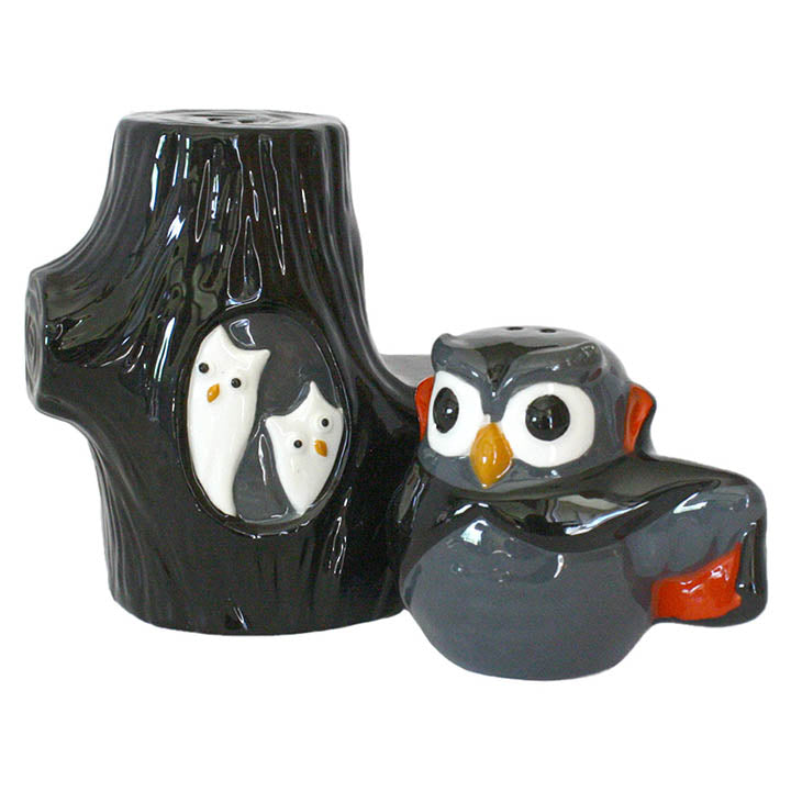 grasslands road midnight owls dracula owl sitting next to tree stump salt and pepper shakers